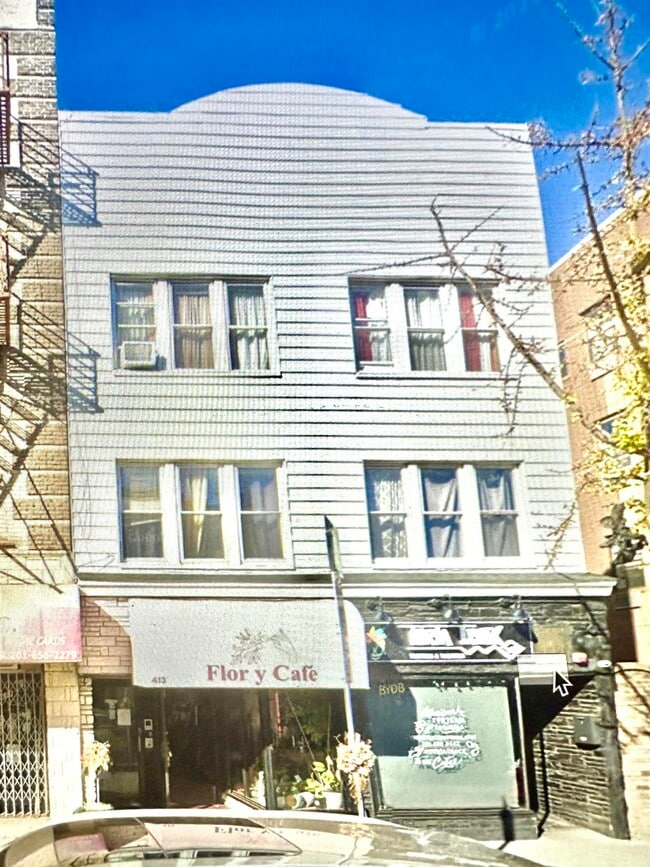 Building Photo - 413 Central Ave Unit left side store
