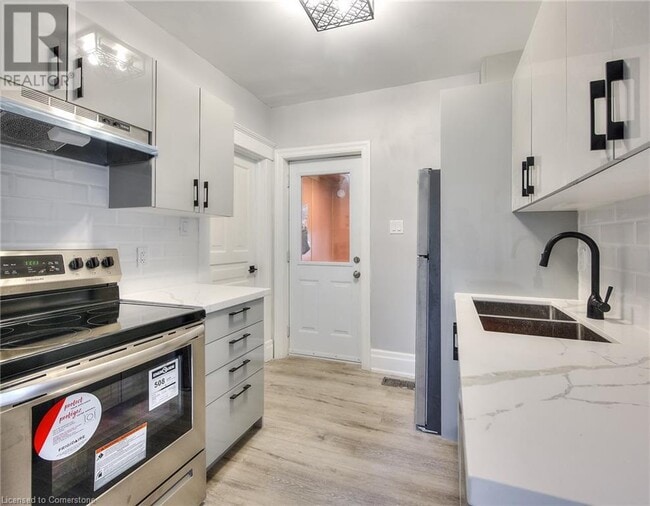 Photo - Upper Level 2 Bed / 1 Bath Unit for Rent in Kitchener, ON - $1,949/month (utilities included) Unit 3