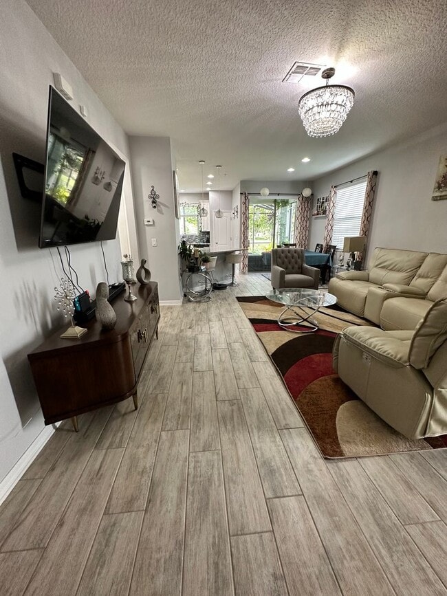 Photo - Lease this 3BR End-Unit Townhome in Gated Community with Water View!