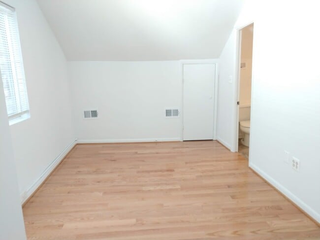 Bedroom with cathedral ceiling. - 2509 10th St NE