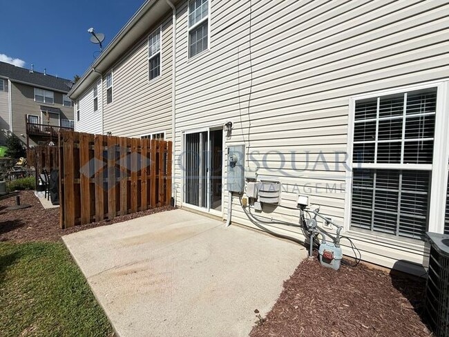 Photo - Lovely 3-Bedroom Townhome with Fireplace, Back Patio & Community Amenities Included! Convenient ...
