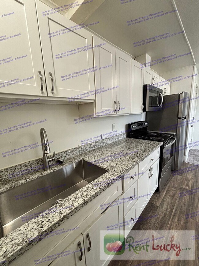 Photo - Singh Tacoma 4-Plex Unit 4