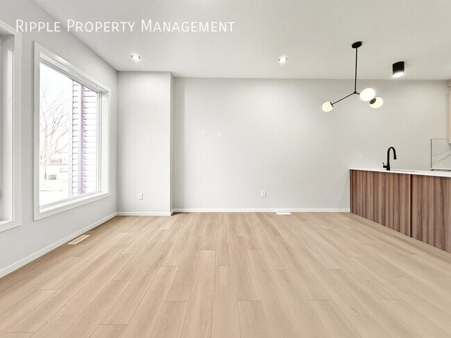 Photo - Modern 2 Beds, 2.5 Baths Main Floor/ Upper | No Pets Allowed