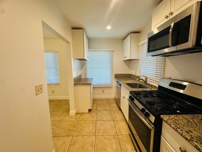 Photo - Come View This Perfect 2 Bedroom 1 Bath Located In the Heart of Downtown!!