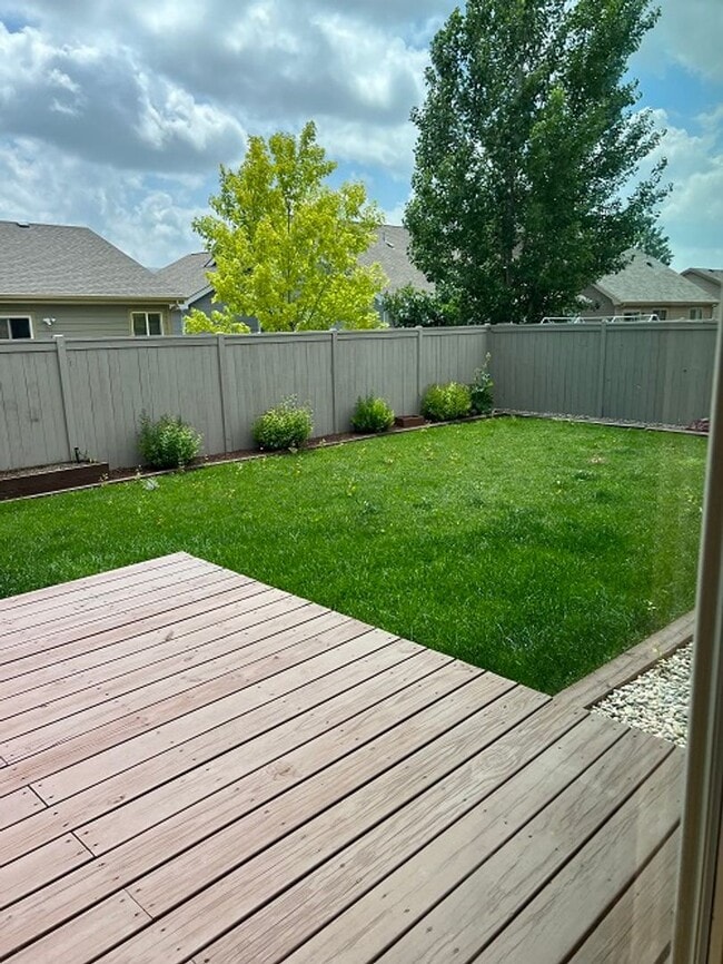 Photo - Spacious 5-Bedroom Home with Finished Basement and 3-Car Garage in Wellington