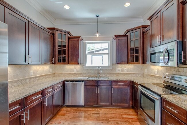 Photo - Stunning 4 Bedroom / Amazing Location / Fenced in Backyard / Beautiful Covered Front Porch