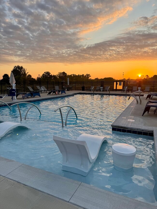 Pool at sunset - The Arcadian Apartments