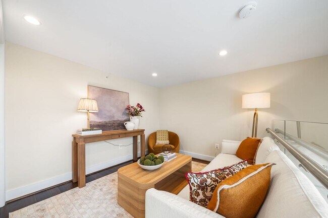 Photo - Stylish 2BR/2BA Bi-Level Condo with Private Roof Deck and Covered Parking!