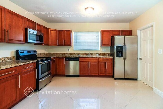 Photo - 5660 W 9th Ct
