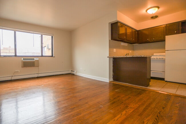 Building Photo - 5859 N Winthrop Ave Unit #207