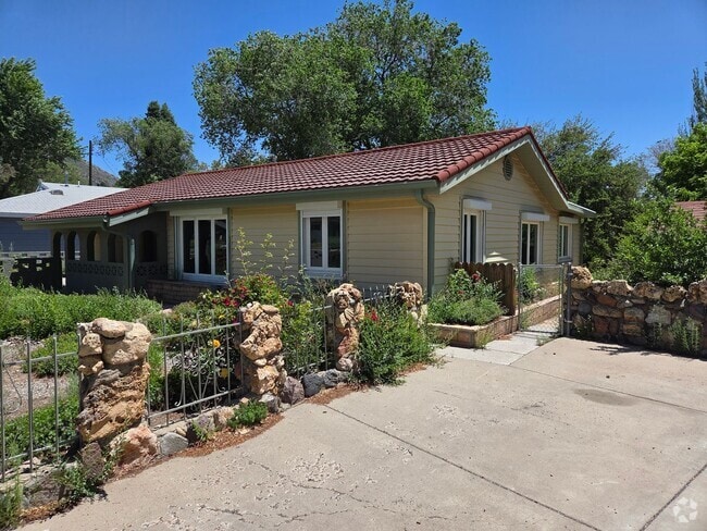 Building Photo - COMING IN JULY! Spacious 4-Bedroom Home in...