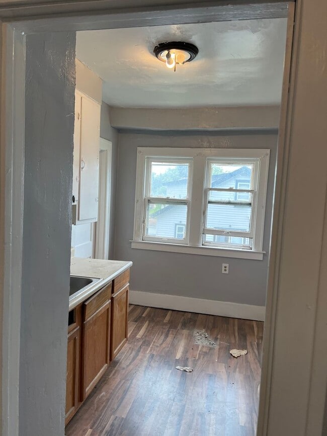 Building Photo - 6691 Barton St Unit Floor 1