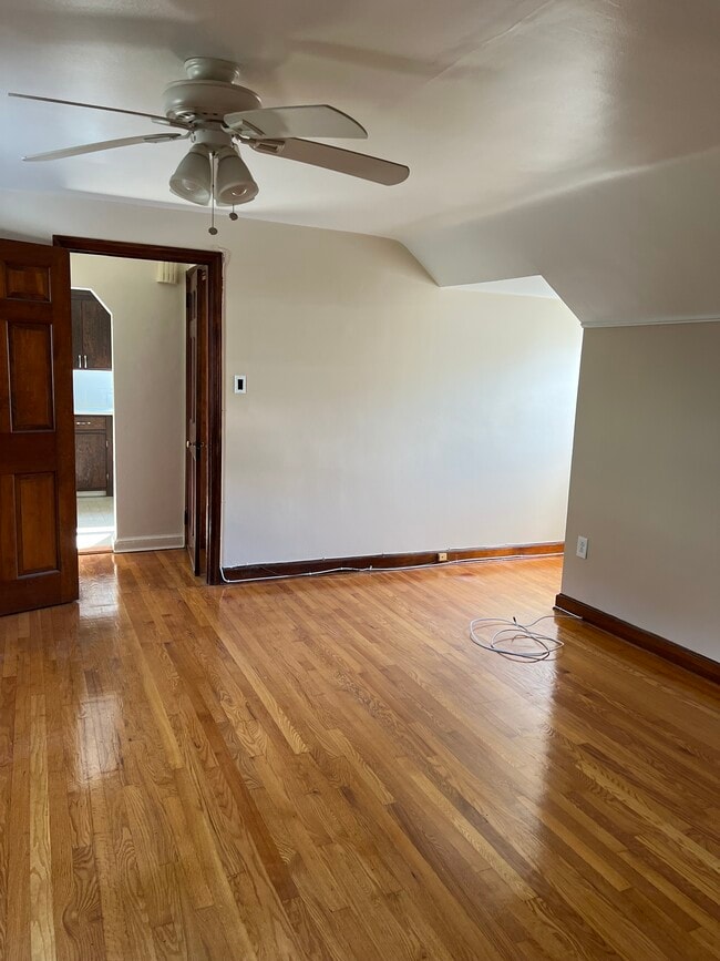 Living room looking at entrance and kitchen