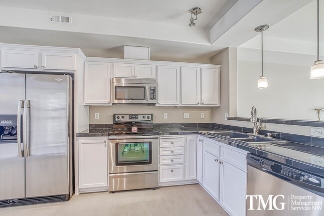 Photo - Bright & Open Living in Tanasbourne Tech Corridor Unit 213