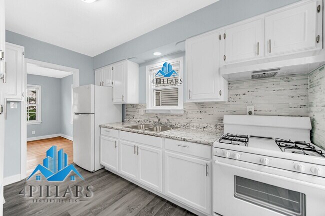 "Charming 3-Bedroom Hammond Home with Hardwood Floors & Finished Basement - 2025 Sq Ft of Comfort!"