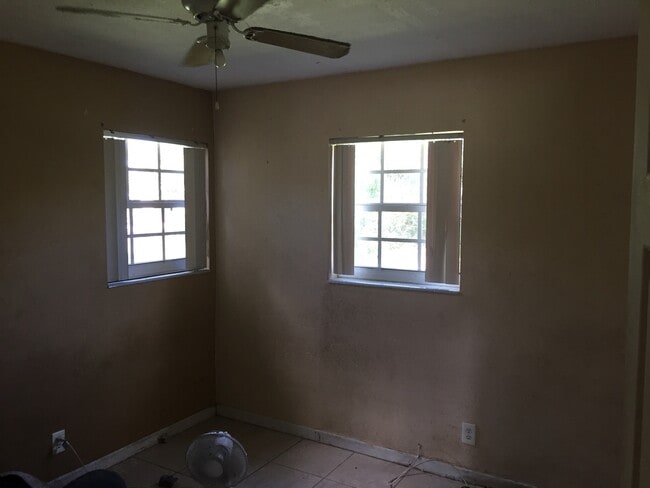 Photo - Amazing 3-1 house with fenced front and backyard !