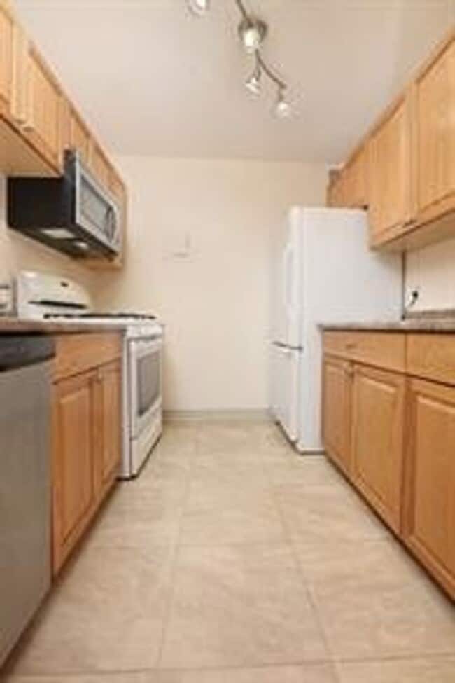 Photo - Short walk to Longwood Medical Area! 2-bedroom, 2-bath residence at the highly desirable Brook Ho...