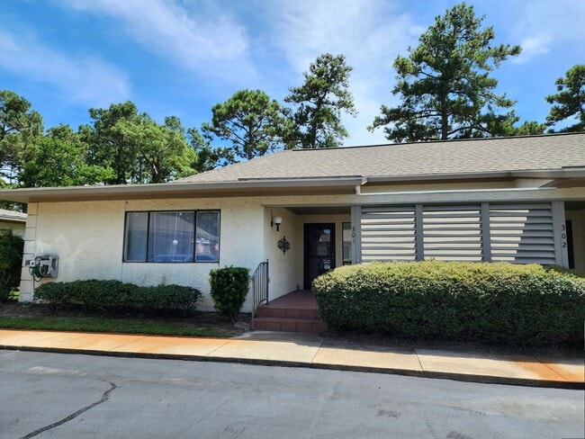 Building Photo - Gulf Shores 2/1.5 condo at Country Club Village