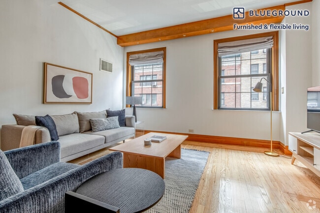 Building Photo - 145 W 58th St Rental
