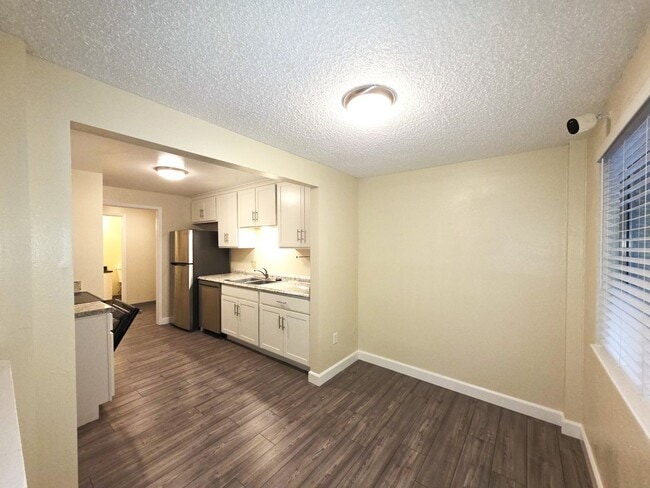 Photo - Large 2 bedroom 1.5 bath 2 car garage townhouse new custom flooring and paint throughout with new...