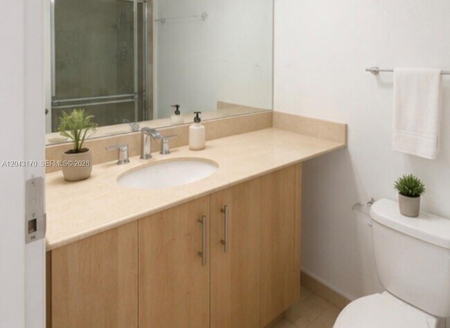 10275 Collins Ave Unit 115