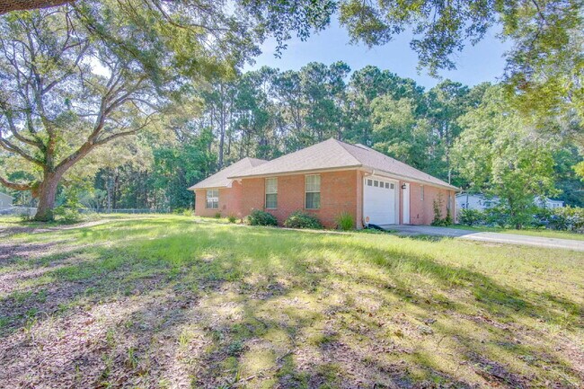 West Pensacola 3BR, 2BA Brick Home Near NAS Pensacola with Screened Porch, Spacious Kitchen & Ope...