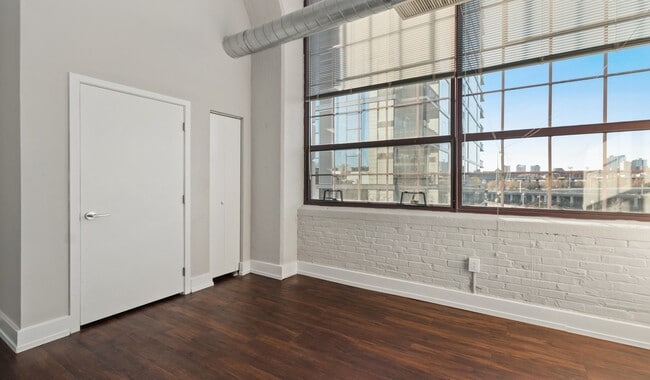 Loft-style homes with wood flooring throughout