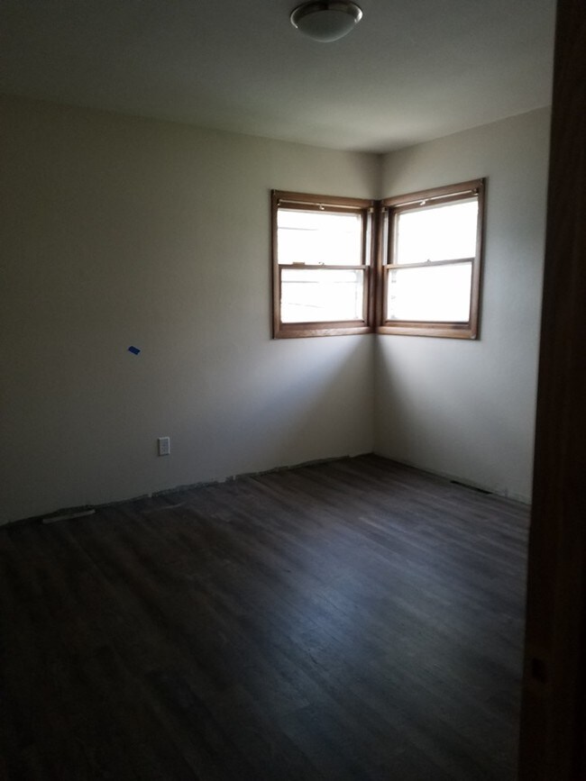 Upper Bedroom with new floor and paint - 217 S Water St
