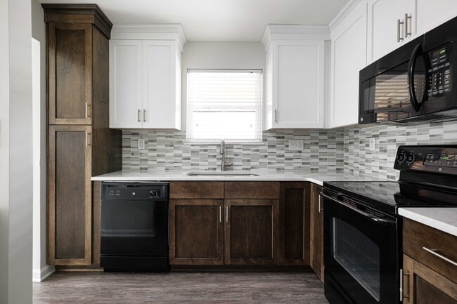 Modern kitchen with custom cabinetry and quartz countertops