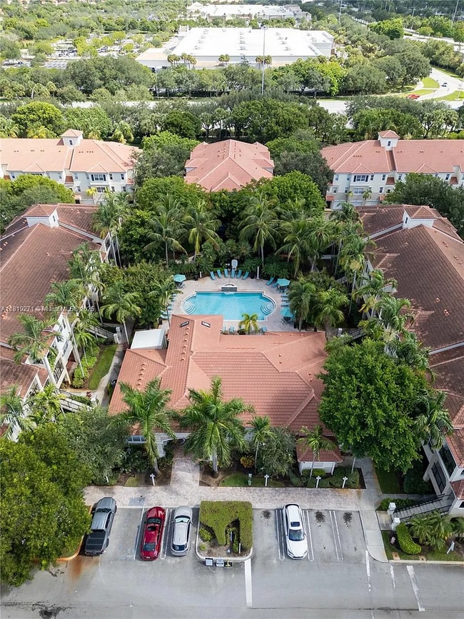 Photo - 5820 W Sample Rd Unidad Poinciana 2-105