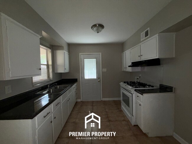 Photo - Charming 3BR Colonial Acres Cottage | Hardwood Floors, Detached Garage & Large Yard