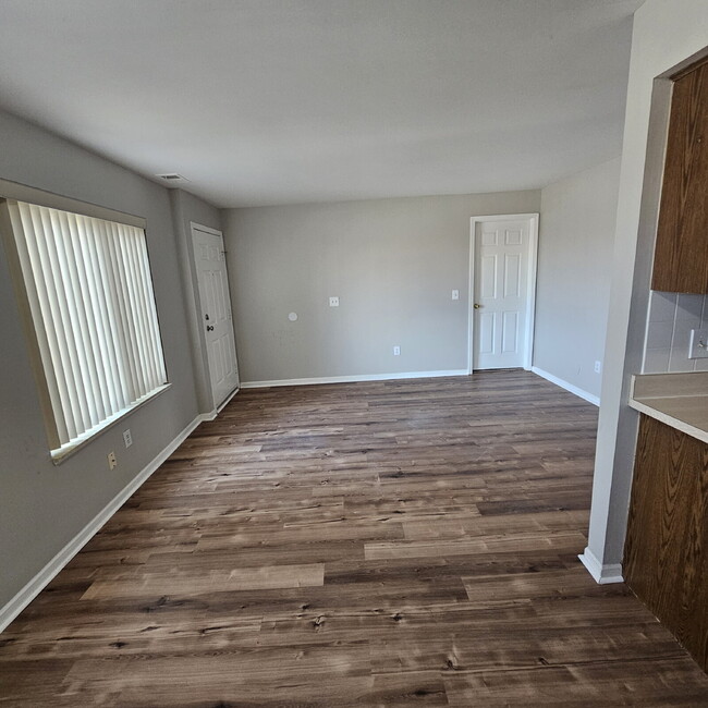 Photo - 2-Bedroom, 1 Bathroom Condo with New Laminate Flooring Throughout The Main Living Area, Kitchen w...