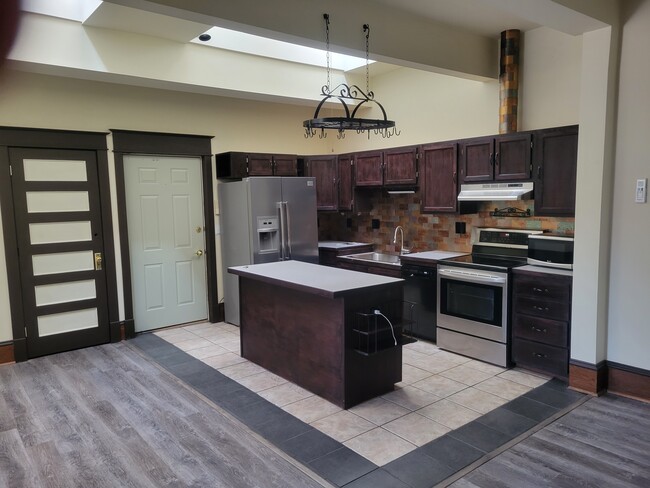 Kitchen (Front entrance with closet) - 519 W College Ave Apartment Unit #2