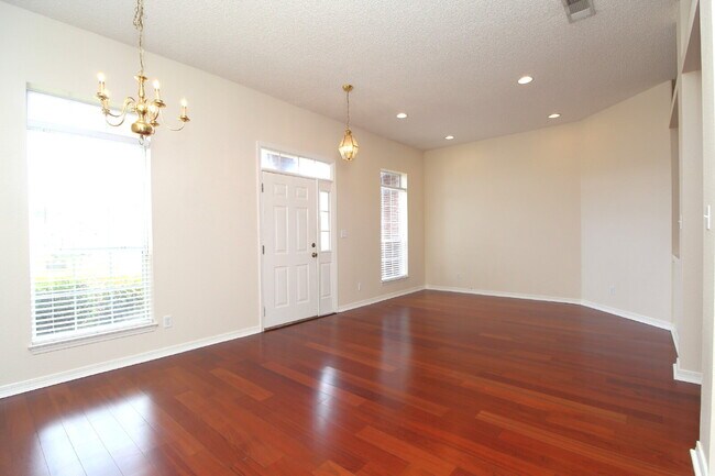 Photo - Spacious 4-Bedroom Home with Pool Care Inc...