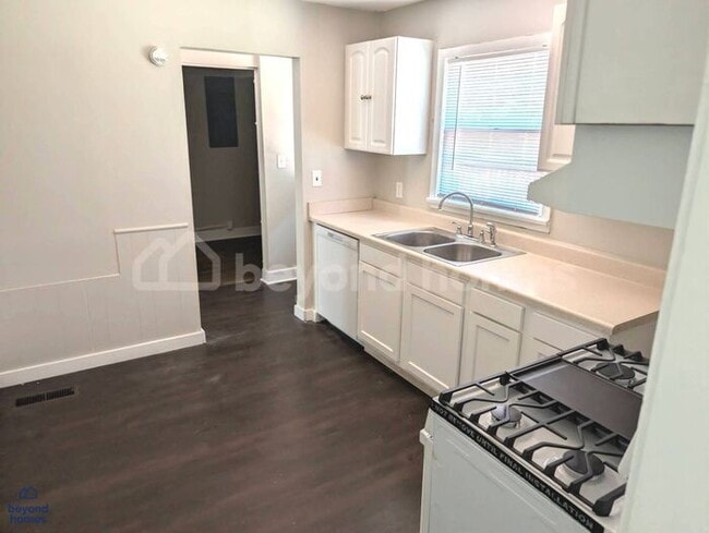 Photo - Updated Bungalow with Massive Deck and Fully Fenced Yard!