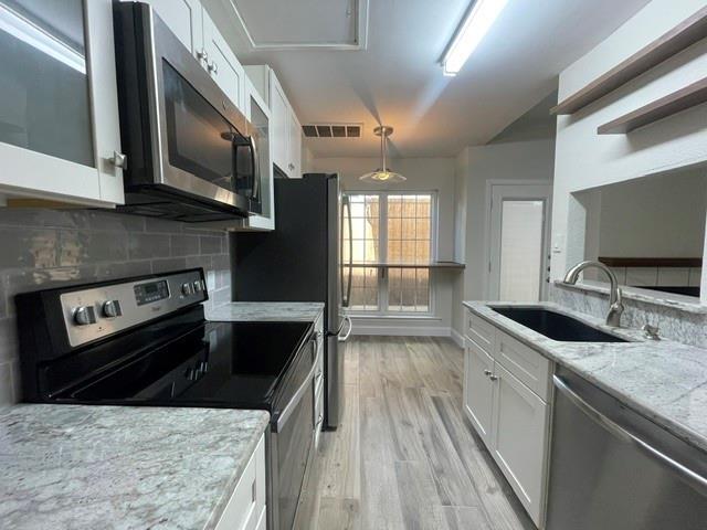 Building Photo - 3904 Rawlins St Unit 113