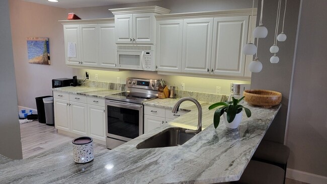 Photo - Annual UNfurnished 2/2 ground floor condo in water front boating community