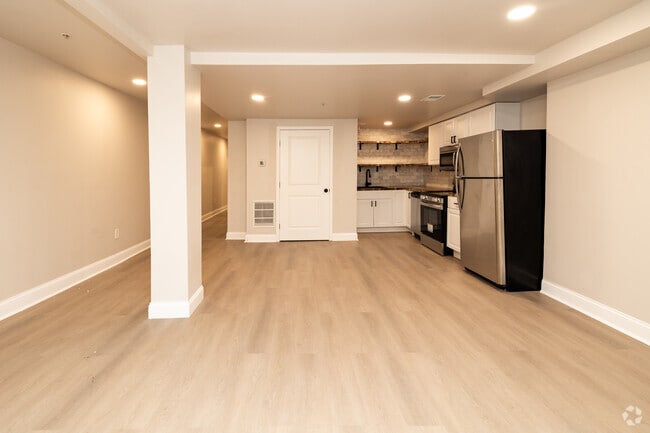 1BR, 2BA - 1,450SF - Living Room - 936 N Calvert St