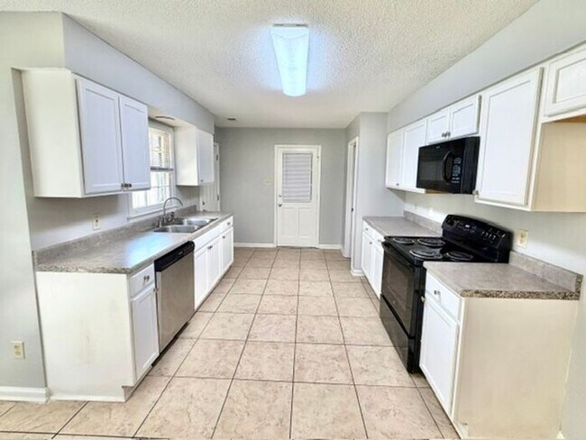 Photo - Now Leasing 4 bedroom 2.5 bath home-Southeast Memphis