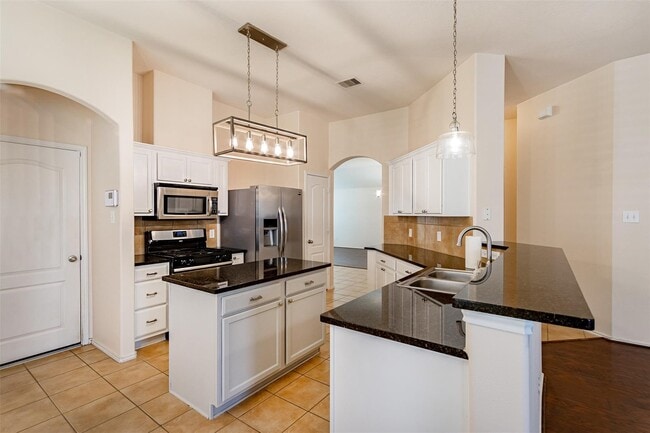 Building Photo - 24807 Lazy Tee Ln