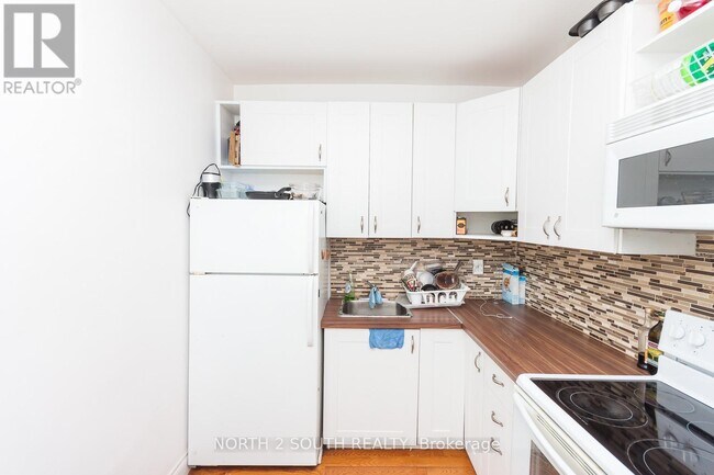 Photo - 1257 King St W Unité Upper