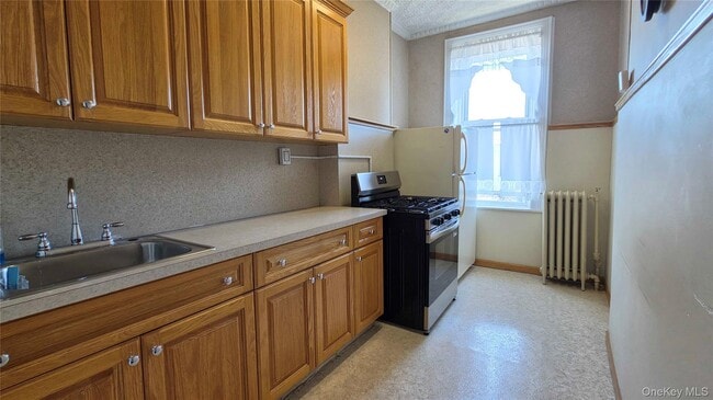 Photo - 60-24 70th Ave