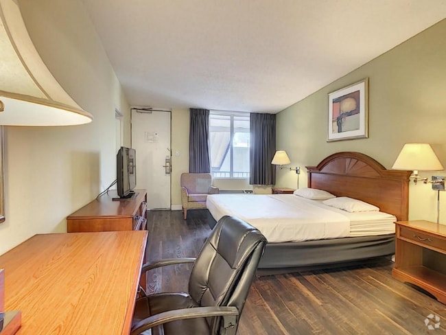 Building Photo - 8700 S Orange Blossom Trl Unit King Room Rental