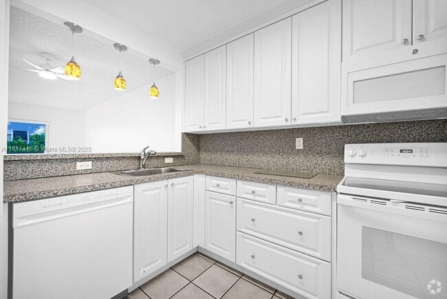 Building Photo - 7740 Camino Real Unit G-407 Rental