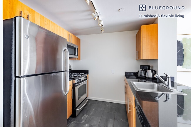 Photo - 4-75-75 48th Ave Unidad FL10-ID1789