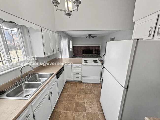 Photo - 5 Bed, 2.5 Bath Home with Fenced Yard & Garage / Available Soon!