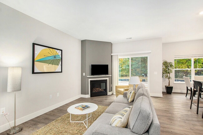 SummitTownhomes_3 habitaciones_Sala de estar con chimenea - The Summit at Harvey Townhomes