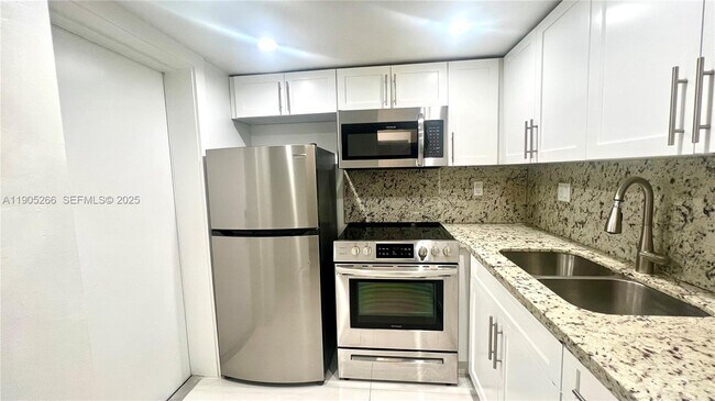 Photo - 234 Antiquera Ave Unidad 12