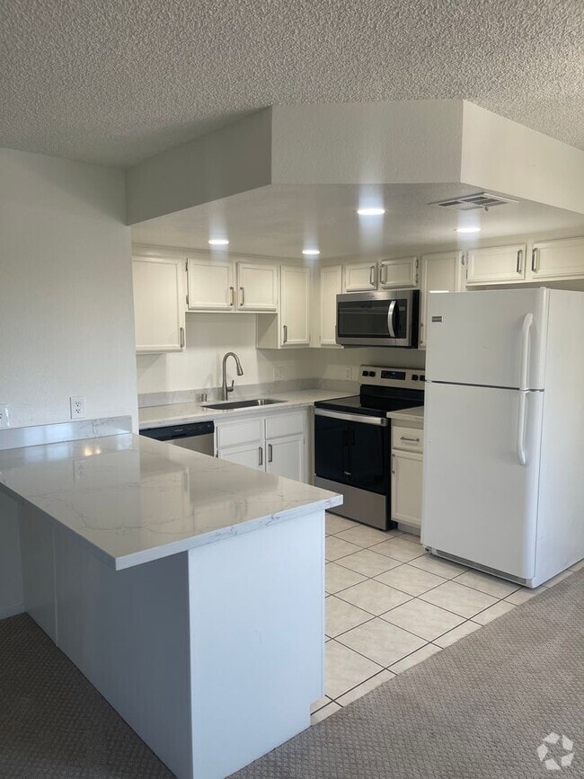 Building Photo - Beautiful upstairs 2-bedroom, 2-bathroom a... Unit 202 Rental