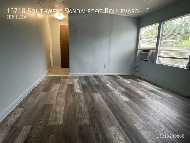 Building Photo - 10718 SW Sandalfoot Blvd Unit E